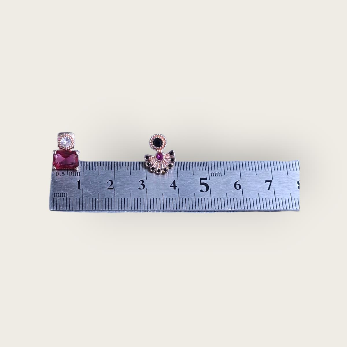 Rose gold cubic zirconia red stone asymmetrical earrings - 이미지 3